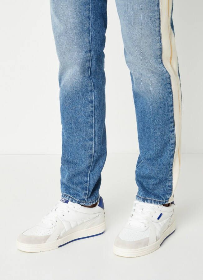 Palm Angels University sneaker van leer met suè, de details